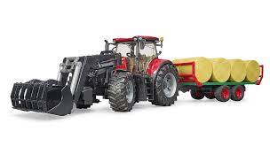 Case IH Optum 300 CVX + rimorchio caricabile